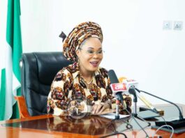 Honourable Minister of Women Affairs, Barrister (Mrs) Uju Kennedy giving an Update on the mass wedding of the orphan girls