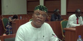 Director, Overseeing the Office of the Permanent Secretary (DOOPS), Mr Clinton Igwe making his presentation at the Public Hearing today.