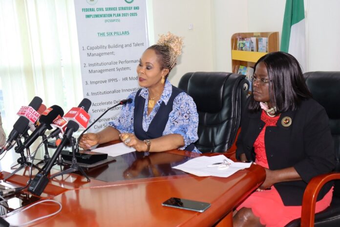 Economic Status of Women2 Honourable Minister of Women Affairs, Barrister (Mrs) Uju Kennedy-Ohanenye addressing journalists at the briefing. To her left is the Director, Women Development Department, Mrs. Funke Oladipo