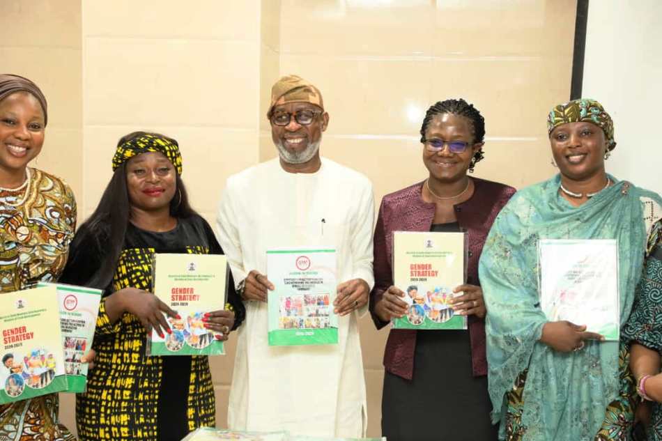 L-R: Representative of the National President of Women In Mining In Nigeria WIMIN, Mrs Emily Ofodile (Social Secretary); N&G Consultant; Hon Minister for Solid Minerals Development Dr Dele Alake; Permanent Secretary, Dr Mary Ogbe & WIMIN Executive; during the Unveiling of the Gender Strategy by the Hon. Minister