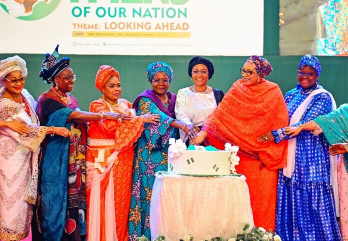 Female President is possible if women unite1 L-R Former Minister, Chief Mrs Nike Akande, wife of former president, Mrs Bola Obasanjo, Former First Lady, Dame Patience Jonathan, Former First Lady, Mrs Victoria Gowon, the First Lady of the Federal republic of Nigeria Senator Oluremi Tinubu, wife of the Vice President Hajia Nana Shettima and wife of the Senate President Mrs Ekaette Akpabio cutting the cake at an event tagged Celebrating the Mothers of our nation in commemoration of the First Anniversary of the Administration of President Bola Ahmed Tinubu held in Abuja on Saturday 25th May