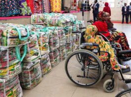Some of the beneficiaries of the Food bags distributed by the Renewed Hope Initiative, RHI to vulnerable groups and persons across the 44 local government areas of Kano state on Thursday 23rd May