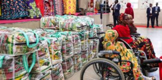 Some of the beneficiaries of the Food bags distributed by the Renewed Hope Initiative, RHI to vulnerable groups and persons across the 44 local government areas of Kano state on Thursday 23rd May