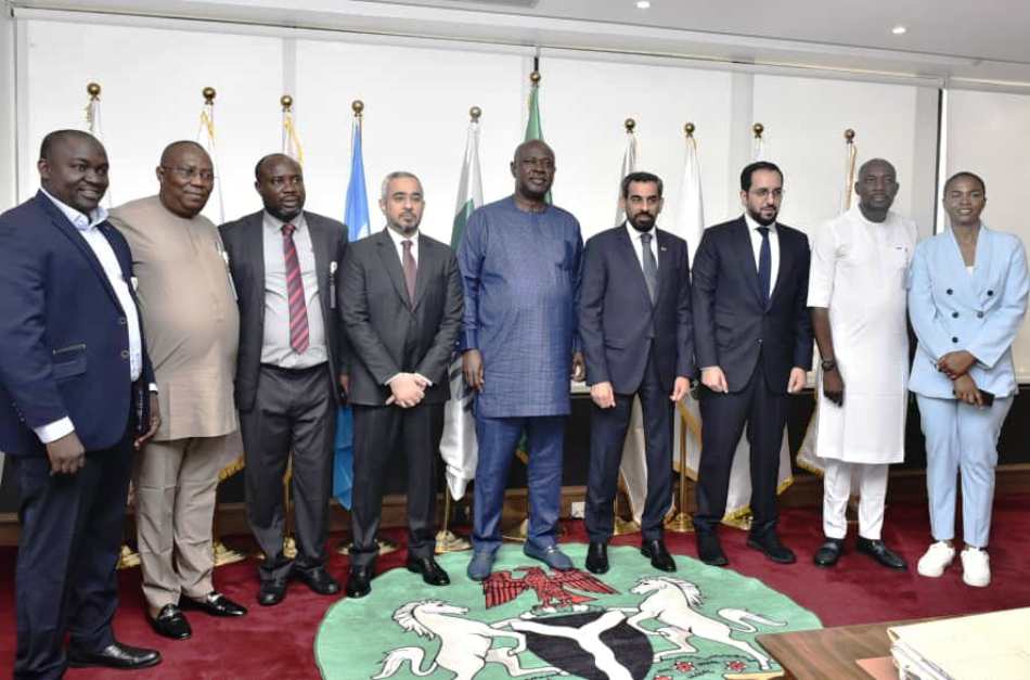Sen. Heineken Lokpobiri (5th from right),UAE Ambassador to Nigeria, HE. Salem Saeed Al-Shamsi (6th from right) in a group photograph with the officials of the Ministry and members of the Ambassador's delegation.