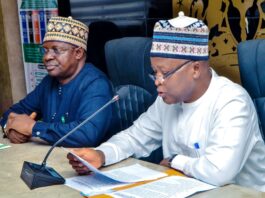 Hon Minister of State, Abdullahi Tijjani Gwarzo inaugurating members of Implementation commitee of the Renewed Hope Cities and Estates, Karsana, Abuja.