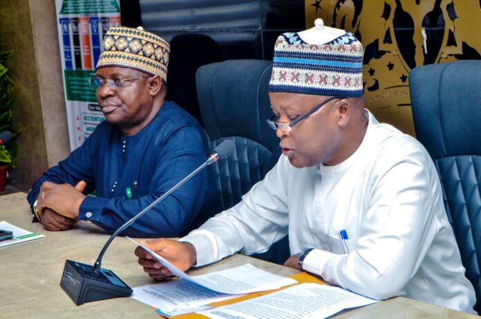 Hon Minister of State, Abdullahi Tijjani Gwarzo inaugurating members of Implementation commitee of the Renewed Hope Cities and Estates, Karsana, Abuja.