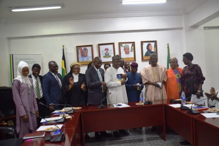 L-R: Nafisa Abugu (ICPC); Japhet David (ICPC); Agualize Ejimeke (ICPC); Barrister Nkem Ezenwa (ICPC), Representative of Chairman (ICPC) Director of the System Study and Review Department (SSRD) Mr. Olusegun Adigun; Permanent Secretary, Dr. Nasir Sani Gwarzo; Chairman (MPA Anti-Corruption and Transparency Unit (ACTU)/ (Deputy Director, Police Performance Monitoring) Mr. Ezekiel Audu; Director Reforms Coordinator and Service Improvement, Msheibwala Ibrahim Musa and other members during the Inauguration of the 11-Man member of the Anti-Corruption and Transparency (ACTU) Unit at the Ministry Headquarters in Abuja.