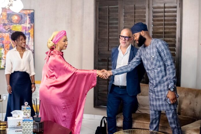 NIMC during a courtesy visit1 Honourable Minister of Arts, Culture and the Creative Economy Barrister Hannatu Musa Musawa welcomes Alfonso Perez-Soto, President, Emerging Markets at Warner Music Group and Ayodele Babalola, Technical Assistant on Media and Communications to the Director General,National Identity Management Commission NIMC during a courtesy visit.