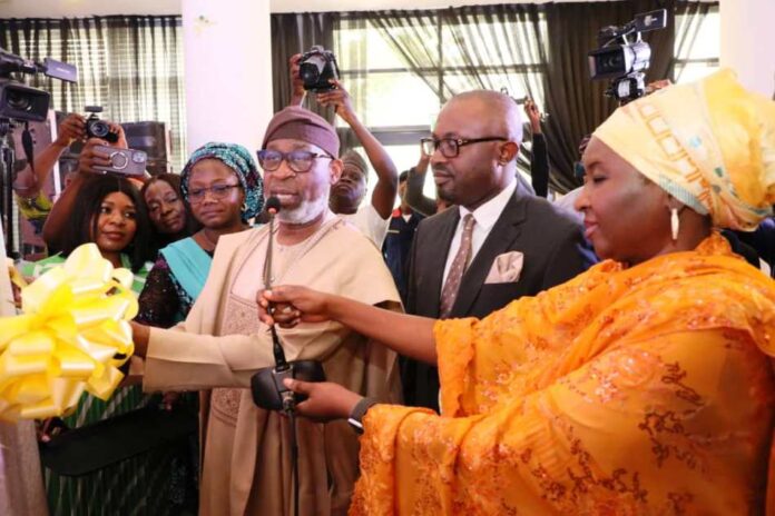 NMDSS1 he Hon. Minister of Solid Minerals Development, Dr Dele Alake unveiled the Nigeria Minerals Decisions Support System Software today Tuesday 14 May 2024; @ the Petroleum Technology Development Fund ((PTDF) Conference Hall, Abuja: Dr Alake was assisted by the Hon. Minister For Interior, Dr. Olubunmi Tunji-Ojo and Permanent Secretary, Dr. Mary Ogbe (2ndLeft).