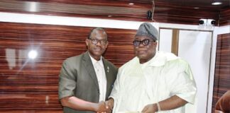 Hon. Chairman FCSC, Prof. Tunji Olaopa (R) with Nigeria Library Association’s President and Chairman of Council, Mr. Dominic Omokaro paid him a courtesy call.