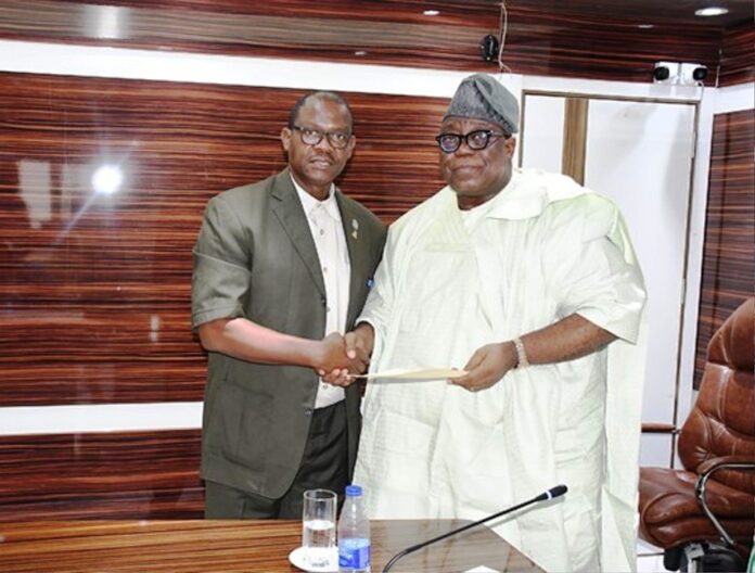 National Library Association visits 3 Hon. Chairman FCSC, Prof. Tunji Olaopa (R) with Nigeria Library Association’s President and Chairman of Council, Mr. Dominic Omokaro paid him a courtesy call.