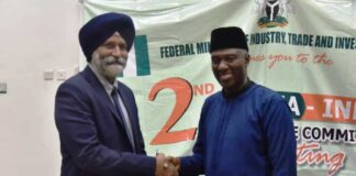 Permanent Secretary Federal Ministry of Industry, Trade and Investment, Amb. Nura Abba Rimi and in a handshake with the leader of Indian Delegation to Nigeria Mr. Amardeep Sigh Bathia, at Second Nigeria-India, joint trade committe meetings in Abuja on Monday.