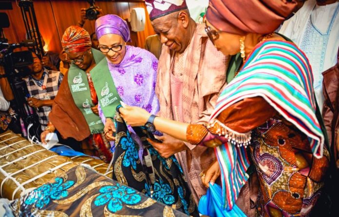 RHI donates Fabrics Wife of Senate President, Mrs Ekaette Akpabio, Wife of the Vice President and representative of the First Lady Hajia Nana Shettima, National Chairman of the APC, Abdullahi Ganduje and APC National Women Leader, Mrs Alile-Idele at the donation of fabrics in commercial quantity by the First Lady, Senator Oluremi Tinubu to APC women held in Abuja on Wednesday 22nd May