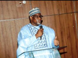 The Permanent Secretary, Ministry of Niger Delta Development, Dr. Shuaib Belgore giving his opening remarks at the 2- day Performance Management System workshop.