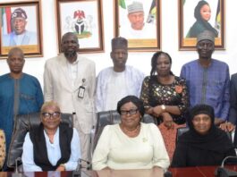 Seated L-R: Napoleon Enayaba (UNDP); consultant to the United Nations Development Programme (UNDP), the Executive Director, the Rule of Law and Empowerment Initiative, Kemi Okenyodo, Director Planning Research and Statistics, Margaret Azeez; Director Legal Services, Fati Lamorde; Director General Services, Mrs Edemanya Ibilola Brayila and other management staff during the presentation of a draft Police Regulations to the management of the Ministry at the Headquarters of the Ministry of Police Affairs in Abuja