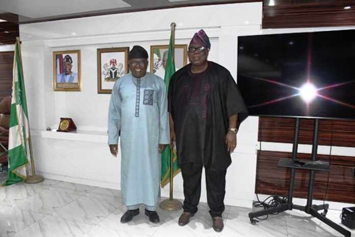 online training deepening in the Civil Service1 Hon. Chairman FCSC, Prof. Tunji Olaopa (R) with Taraba State Head of the Civil Service- Mr. Paul Maigada Tino in his office.