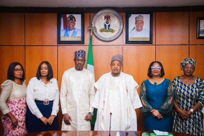3rd Left - The Managing Director/Chief Executive, Nigerian Film Corporation, Dr. Ali Nuhu, Hon. Minister of Budget and Economic planning, Senator Abubakar Atiku Bagudu, Director/Economic Growth, Mrs. Elizabeth Egharevba and other dignitaries during the Corporation's courtesy visit to the Ministry, today, in Abuja.