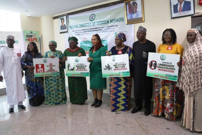FG Rolls Out Safeguards to Check GBV 5th from left - Honourable Minister of Women Affairs, Barrister (Mrs) Uju Kennedy-Ohanenye and some Stakeholders with samples of the signposts designed for hotels, schools and hospitals during the Partnership Meeting