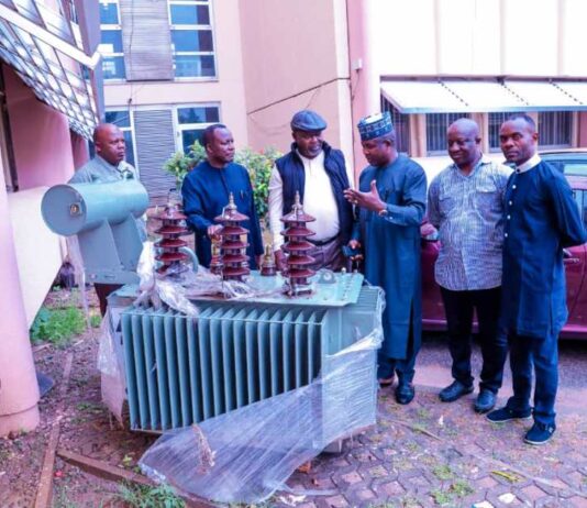 (2nd left) Director General Services Federal Ministry of Humanitarian Affairs and Poverty Alleviation, Yakubu John (4th left) Agabus Datukum and other officials of the Ministry during the hand over of the 500KVA transformer to the Ministry by the ICPC