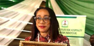Hon.Minister Of Tourism, Lola Ade -- John Given An Award by Nihotous