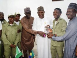 L-R: Mene Eyimofe Edith (NYSC); Director Human Resource Management; Mr. Stephen B. Simon; Permanent Secretary, Dr. Nazir Sani Gwarzo; Team leader (Corpers), Mr. Adetoyinbo Oluwaferanmi Pamilerin; Senior Special Assistance (Hon. Minister), Mr. Goni Kuwata during a thank you visit by the Ministry Corp members to the Permanent Secretary office in Abuja.
