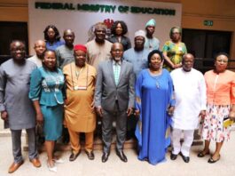 The Honourable Minister of State for Education, Hon. Dr. Yusuf Tanko Sununu (C), flanked Left Dr Elijah Ogbuokiri, President CIDSAN (in Blue gown)Dr Mrs Lami Amodu , FME Staff and other CIDSAN Team Members during the Courtesy Visit in headquarters Abuja.