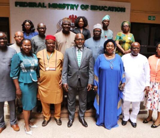 The Honourable Minister of State for Education, Hon. Dr. Yusuf Tanko Sununu (C), flanked Left Dr Elijah Ogbuokiri, President CIDSAN (in Blue gown)Dr Mrs Lami Amodu , FME Staff and other CIDSAN Team Members during the Courtesy Visit in headquarters Abuja.