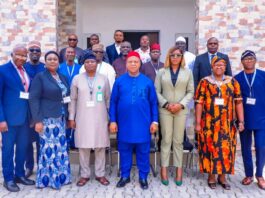 (C) Representative of the SGF, Permanent Secretary, General Services Office, Dr. Nnamdi Maurice Mbaeri, MD, XEM Consultants Ltd, Dr. Eugenia Ndukwe, flanked by participants during a five-day Workshop on Records Management and Automated Work Process for Directors in OSGF on Tuesday, 25th June, 2024 in Abuja.