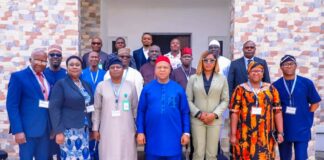 (C) Representative of the SGF, Permanent Secretary, General Services Office, Dr. Nnamdi Maurice Mbaeri, MD, XEM Consultants Ltd, Dr. Eugenia Ndukwe, flanked by participants during a five-day Workshop on Records Management and Automated Work Process for Directors in OSGF on Tuesday, 25th June, 2024 in Abuja.