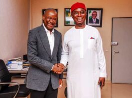 The Honourable Minister of Sports Development, Sen John Owan Enoh in a handshake with the Vice Chairman, Senate Committee on Sports, Sen. Ned Nwoko when the later paid him a courtesy visit in his office recently.