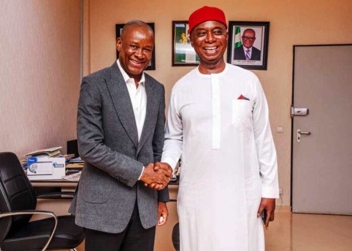 The Honourable Minister of Sports Development, Sen John Owan Enoh in a handshake with the Vice Chairman, Senate Committee on Sports, Sen. Ned Nwoko when the later paid him a courtesy visit in his office recently.