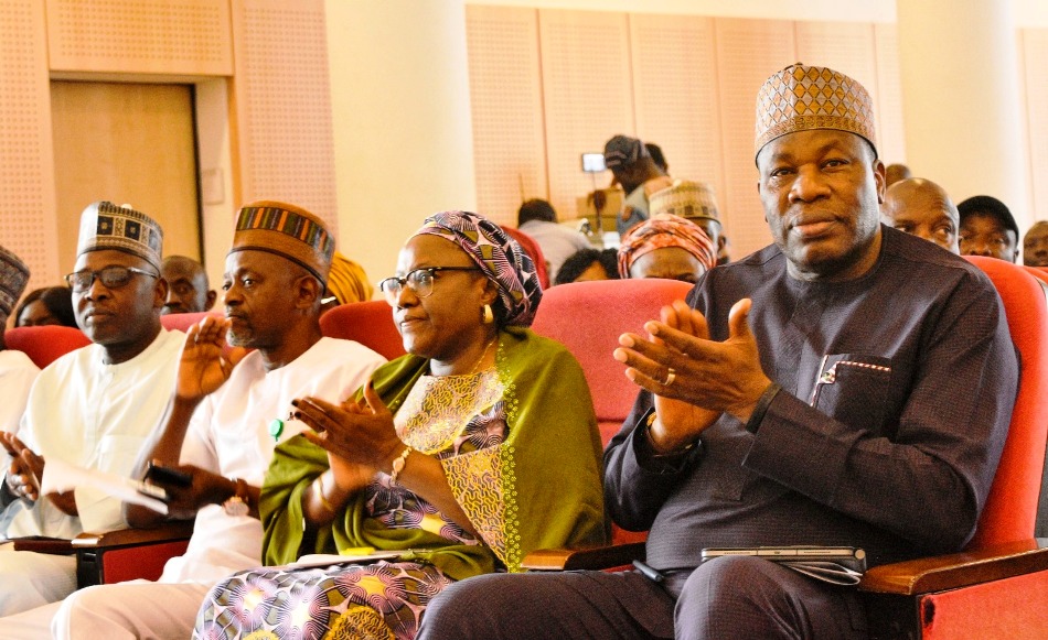 The Permanent Secretary, MPR, Amb. Nicholas Agbo Ella (right) seated with the Director of Human Resources Management, Mrs. Adaji Asma'u Shehu (2nd right); Director of Special Duties, Mr.Tajudeen Salami (2nd left) and Director of Finance and Accounts, Mr. Mohammed Sanusi Danjuma (left) while listening to contributions from members of Staff during the Town-Hall meeting.