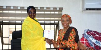 Mrs Nnenna Akajemeli, National Coordinator/ CEO SERVICOM Presidency presenting the report to Ms Kachollom Daju, Permanent Secretary Federal Ministry of Health in Abuja
