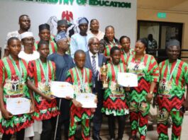 The Honourable Minister of State for Education, Hon. Dr. Yusuf Tanko Sununu (C), Hon. Usman Muhammad Chairman National Advisory Board (in white Native) and Team Benue Champions during the presentation of awards at FME headquarters Abuja.