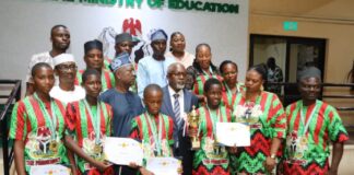 The Honourable Minister of State for Education, Hon. Dr. Yusuf Tanko Sununu (C), Hon. Usman Muhammad Chairman National Advisory Board (in white Native) and Team Benue Champions during the presentation of awards at FME headquarters Abuja.