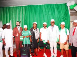 Hon. Minister of Sport Development, Sen. John Owan Enoh, the Permanent Secretary, Mrs. Tinuke Watti, France de affair to Nigeria, H. E Jean-Francois Hasperue with some Nigeria athletics during the handing over and farewell ceremony of team Nigeria contingent for the Paris 2024 Olympics & Paralympic Games in Abuja on Monday