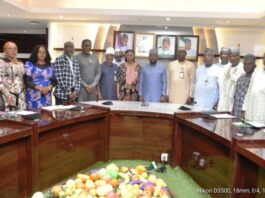 The Permanent Secretary, FMAFS, Mr Temitope Fashedemi (C), and Members of the Committee during the inauguration ceremony.