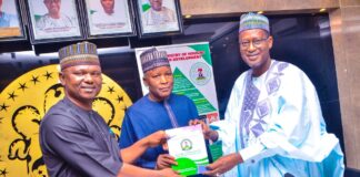 Executive Secretary, Dr James David Lulu presenting the National Accessible Regulations for Persona With Disabilities to the Honourable Minister of Housing and Urban Development, Arc Ahmed Musa Dangiwa and his State Counterpart, Abdullahi Tijjani Gwarzo when during a courtesy visit to the ministry by the National Commission for Persons With Disabilities