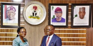 The new Permanent Secretary, Ministry of Steel Development, Dr. Chris Osa Isokpunwu (right) with the former Permanent Secretary, Ministry of Steel Development, Dr. Mary A Ogbe (left) during the Handover Ceremony held on July 29, 2024 at the Ministers' Conference Hall, Ministry of Solid Minerals/Steel Development Headquarters, Abuja.