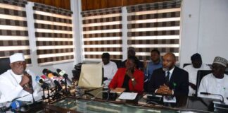 The Honourable Minister of Special Duties and Inter-governmental Affairs, Zaphaniah Jisalo (l) at the Press briefing in Abuja.