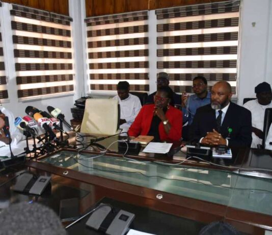 The Honourable Minister of Special Duties and Inter-governmental Affairs, Zaphaniah Jisalo (l) at the Press briefing in Abuja.