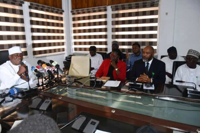 The Honourable Minister of Special Duties and Inter-governmental Affairs, Zaphaniah Jisalo (l) at the Press briefing in Abuja.