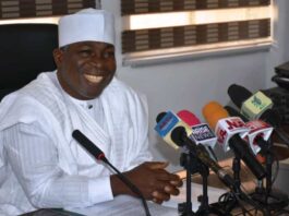 The Honourable Minister of Special Duties and Inter-governmental Affairs, Zaphaniah Jisalo, at the Press briefing in Abuja.