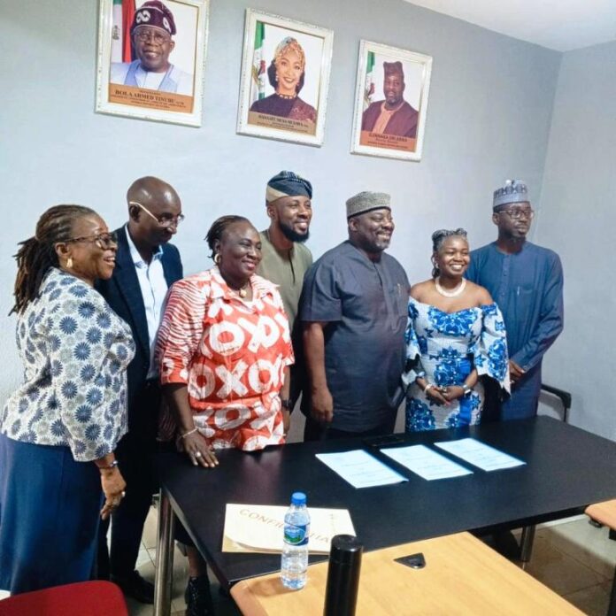 National Council for Arts and Culture Co-founders of Mefa Abuja, Yinka and Bọlá Obebe with the Director General of the National Council for Arts and Culture, Obi Asika after the signing ceremony
