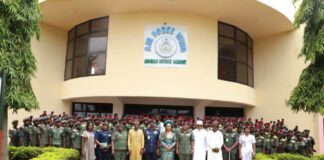 7th from left - Honourable Minister of Women Affairs, Barrister (Mrs) Uju Kennedy-Ohanenye, NDA Commandant, Major Gen. John Ochai, dignitaries, and female cadets in a group picture during her visit to the Institution
