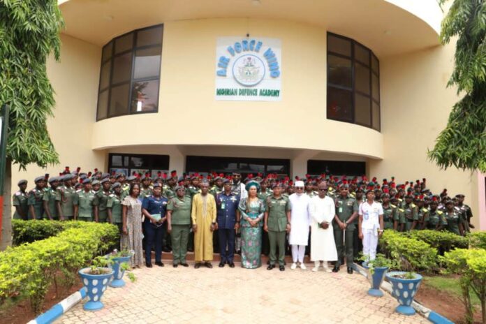 Women Affairs Minister Charges Nigerian Defence Academy 7th from left - Honourable Minister of Women Affairs, Barrister (Mrs) Uju Kennedy-Ohanenye, NDA Commandant, Major Gen. John Ochai, dignitaries, and female cadets in a group picture during her visit to the Institution