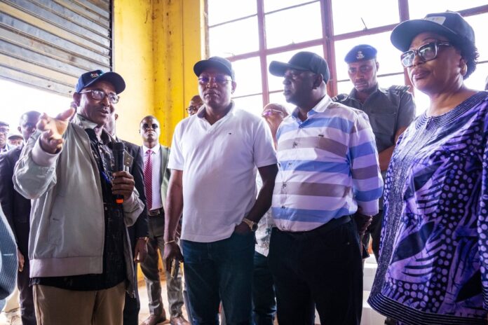 Completion of Middle Ogun Irrigation Project 4 The Honourable Minister of Water Resources and Sanitation, Engr. Prof. Joseph Terlumun Utsev (2nd from right), Dr. Adedeji Ashiru, Managing Director of Ogun-Oshun RBDA (3rd from left), and other members of the Minister’s entourage being briefed by Mrs. Florence Oyakhirome (right), representative of the Director of Irrigation and Drainage, during the inspection visit to the Middle Ogun Irrigation Project (MOIP).