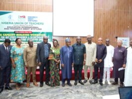 Hon. Minister of State for Education, Dr. Yusuf Tanko Sununu (Centre), Comrade Audu Titus Amba( flanked Right), National President, Nigeria Union of Teachers (NUT) and other participants at the one-day Capacity Building Workshop for State Chairmen and Secretaries of the Union held on 12th September, 2024 at De Silver Green Luxury Hotel, Gudu, Abuja.
