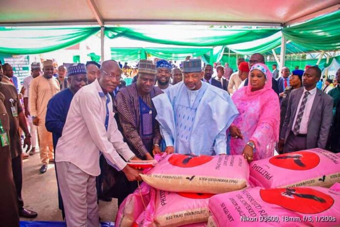 FG Flags-Off Of The Sales Of Milled Rice From, R-L, the Minister of State, FCT, Dr. Mariya Bunkure, Minister of Agriculture and Food Security, Sen Abubakar Kyari and Minister of State for Agriculture and Food Security, Sen Dr Aliyu Sabi Abdullahi during the flag-off.