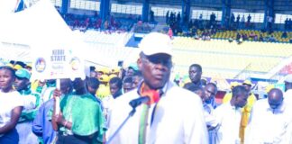 The Honourable Minister of Sports Development, Sen. John Owan Enoh delivering his speech at the opening ceremony of the 8th National Youth Games held in Asaba, Delta State